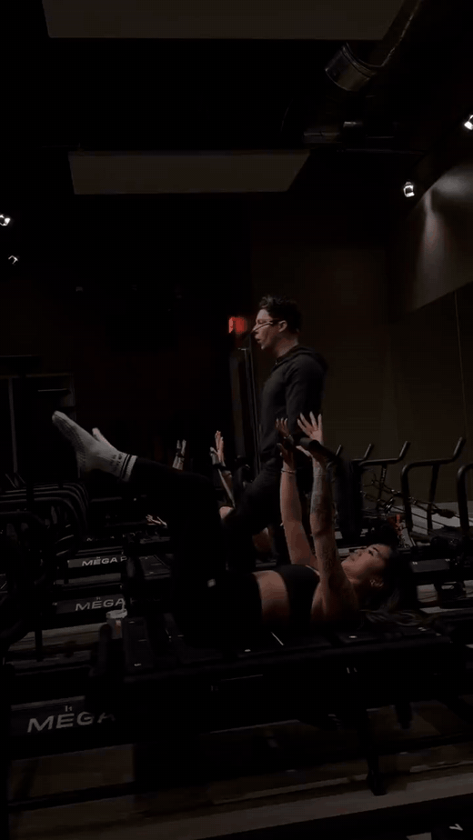 Justin teaching and coaching Lagree